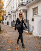 Camille Polka Dot Bag in Black, worn crossbody