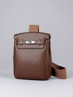 Sinclair brown sling bag - studio product photo