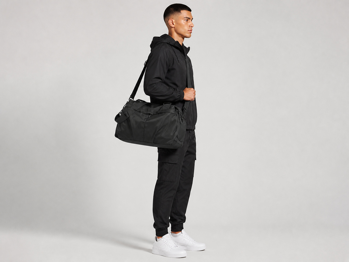 Aurelius Duffel Bag - worn crossbody, side view