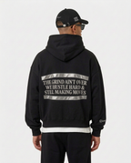 Back print of the black Hustler Mid R3 hoodie by R3CEIVED on model