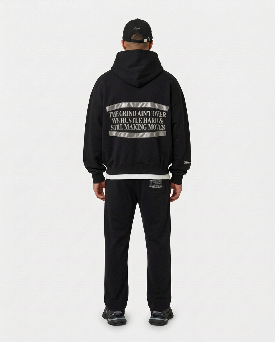 Full-body back view of the black Hustler Mid R3 hoodie by R3CEIVED