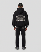 Full-body back view of the black Hustlers Classic Hoodie by R3CEIVED