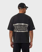 Back print of the black Hustlers Washed Drop-Shoulder T-Shirt by R3CEIVED on model