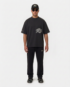 Full-body look with the black Hustlers Washed Drop-Shoulder T-Shirt by R3CEIVED
