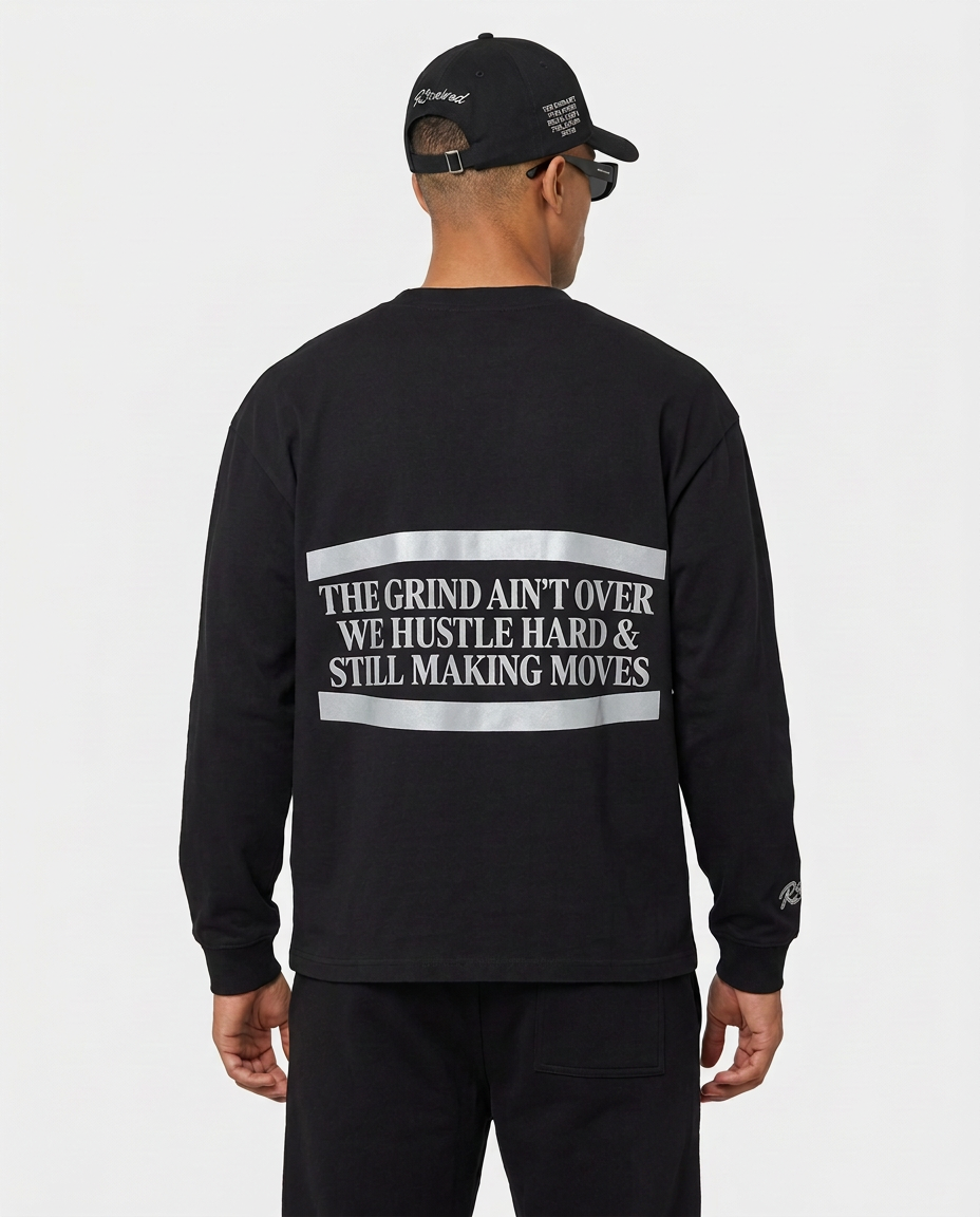 The Hustlers Long Sleeve Shirt black - model back view with print