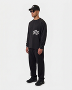 The Hustlers Long Sleeve Shirt black - model angled side view