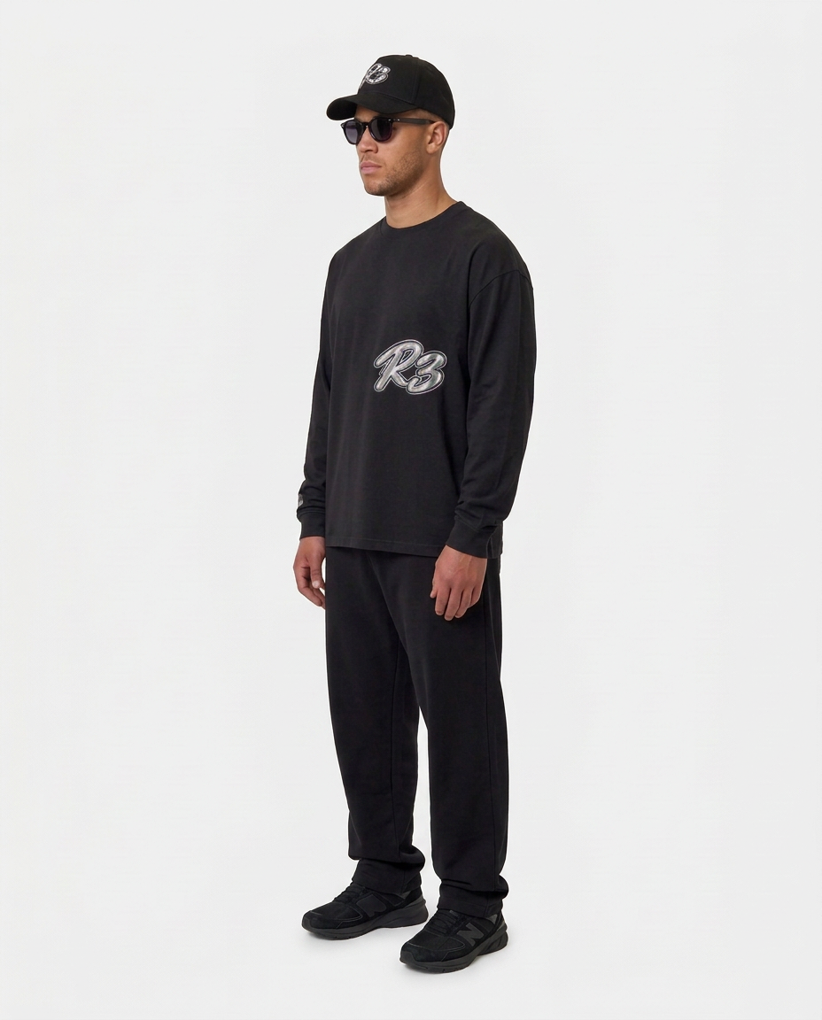 The Hustlers Long Sleeve Shirt black - model angled side view