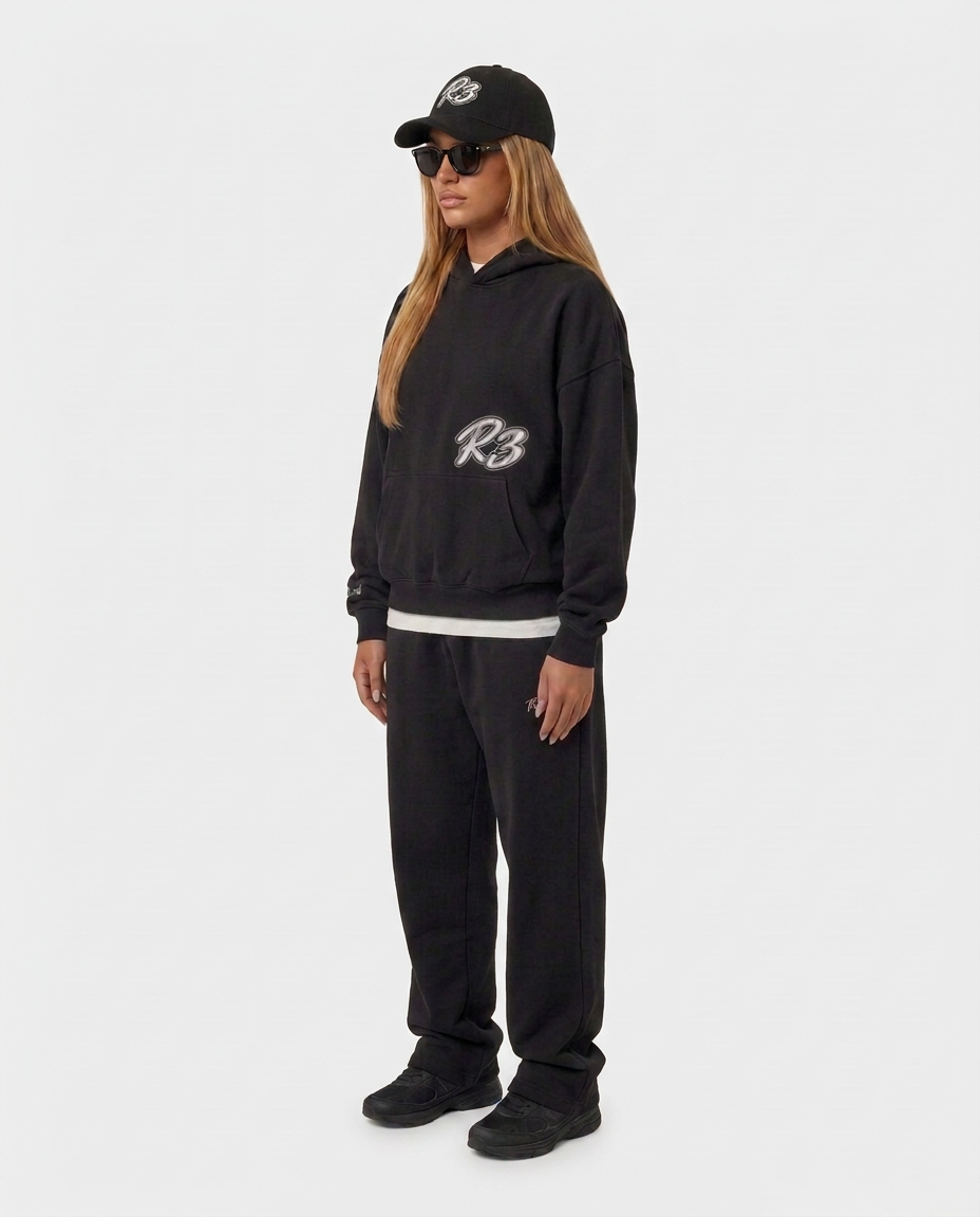 The Hustlers Classic Hoodie black - female model angled view