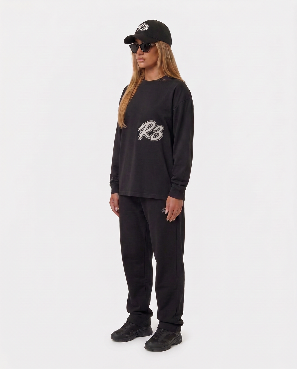 The Hustlers Long Sleeve Shirt black - female model angled view