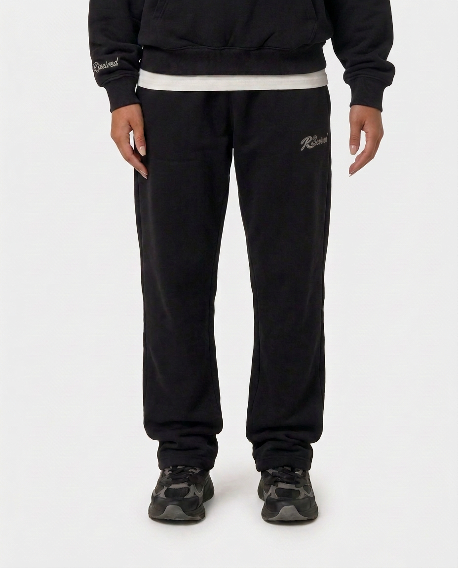 The Hustlers Jogger black - female model front view