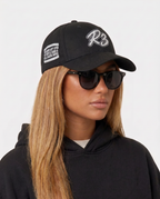 Hustlers Cotton Baseball Cap black - female model angled view with side print